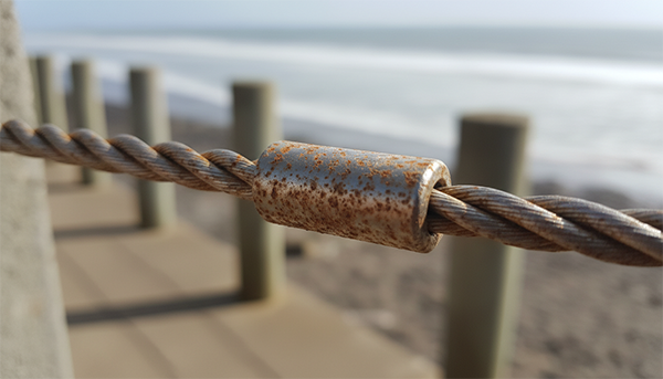 Tea Staining on Stainless Steel Wire Rope A beautiful stainless steel balustrade showing light brown "tea staining" near the coast.