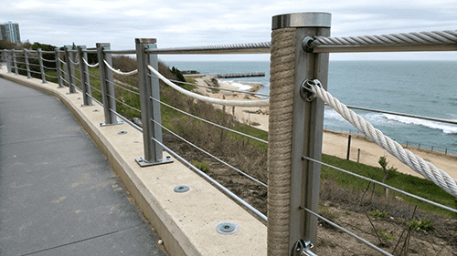 Wire Rope Sag Comparison A diagram showing a 7x19 wire rope sagging between posts compared to a taut 7x7 rope